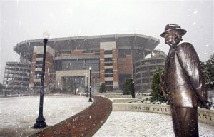 Snow falls on a statue of former University of Alabama football coach Paul "Bear" Bryant in front of Bryant-Denny Stadium on the University of Alabama campus in Tuscaloosa, Ala., Sunday, March 1, 2009. A rare March snow has blanketed much of Alabama and winter storm warnings are in effect along the U.S. East Coast. (AP Photo/Tuscaloosa News, Dan Lopez)